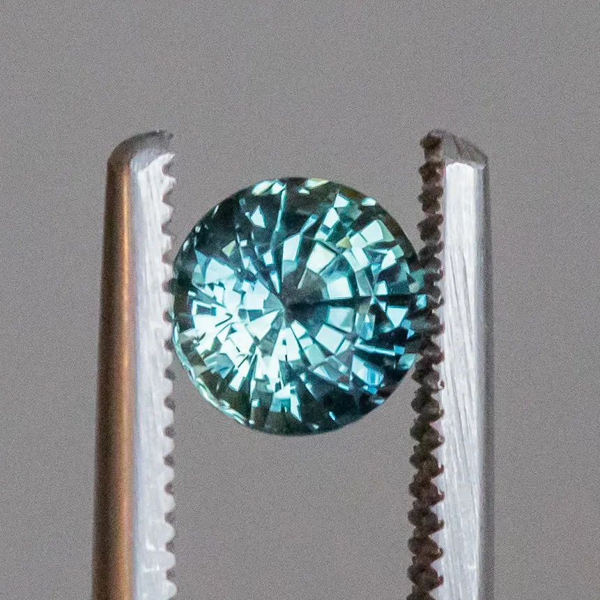 1.20CT BRILLIANT ROUND MADAGASCAR SAPPHIRE, LIGHT TEAL BLUE, 6X4.11MM