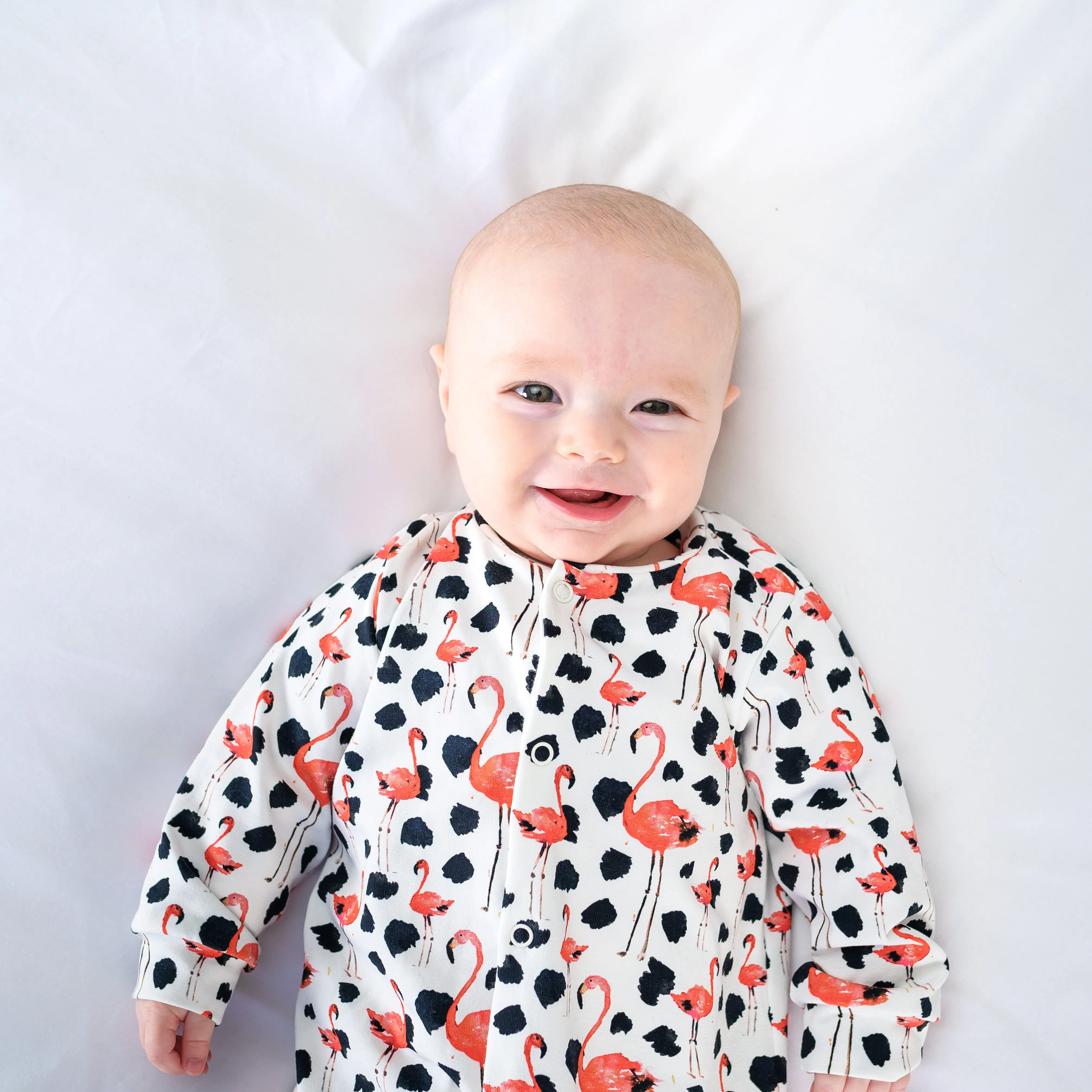 Dotty Flamingo print sleepsuit